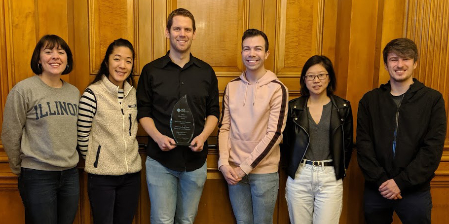 2018 YCC board members Alison Wallum, Aya Kelly, Thomas Bearrood, Kyle Shelton, Cindy Lee, and Oleg Davydovich pose with their award.