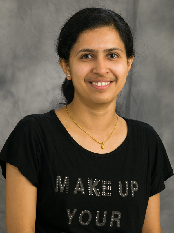 Dinumol Devasia headshot