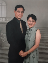 Portrait of Dekai Loo standing next to Jianjian Zhang holding hands