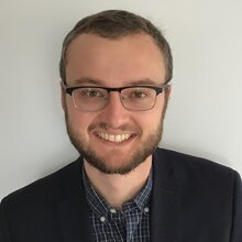 Head shot of Nick Jackson on a white background.