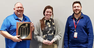 Megan Kats, middle, receiving Cabot Microelectronics' Global EHS Excellence Award