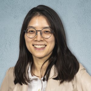 Head shot of Hee-Sun Han on a light blue background