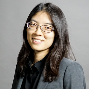 Head shot of Hee Sun Han on a gray background