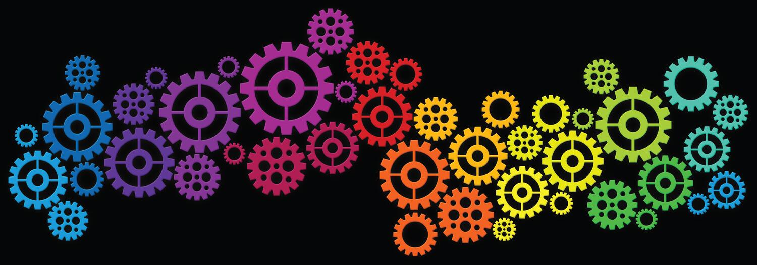 Multi-colored gears on black background