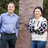 Photo of Andrew Gewirth in a blue button-down shirt standing next to graduate student Stephanie Chen in an outdoor photo on the UIUC campus 