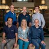 Photo of the EFRC research team members with three standing and three sitting in an atrium area of a campus building.