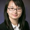 Portrait of Qian Chen on a dark background