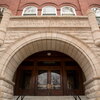 Photo of the west-facing stone arch entrance to Noyes Laboratory.