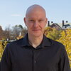Head shot of Doug Mitchell in an outdoor setting