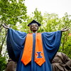 Alma Mater dressed in a cap and gown